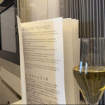 Welcome to First Class menu and champagne
